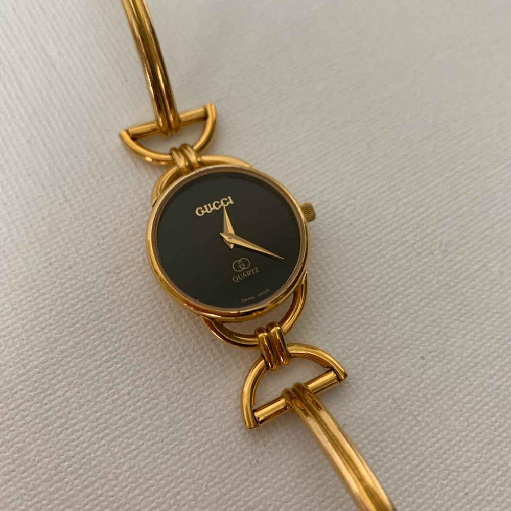 *SOLD Gucci Black and Gold Tone Watch, Model 6200L